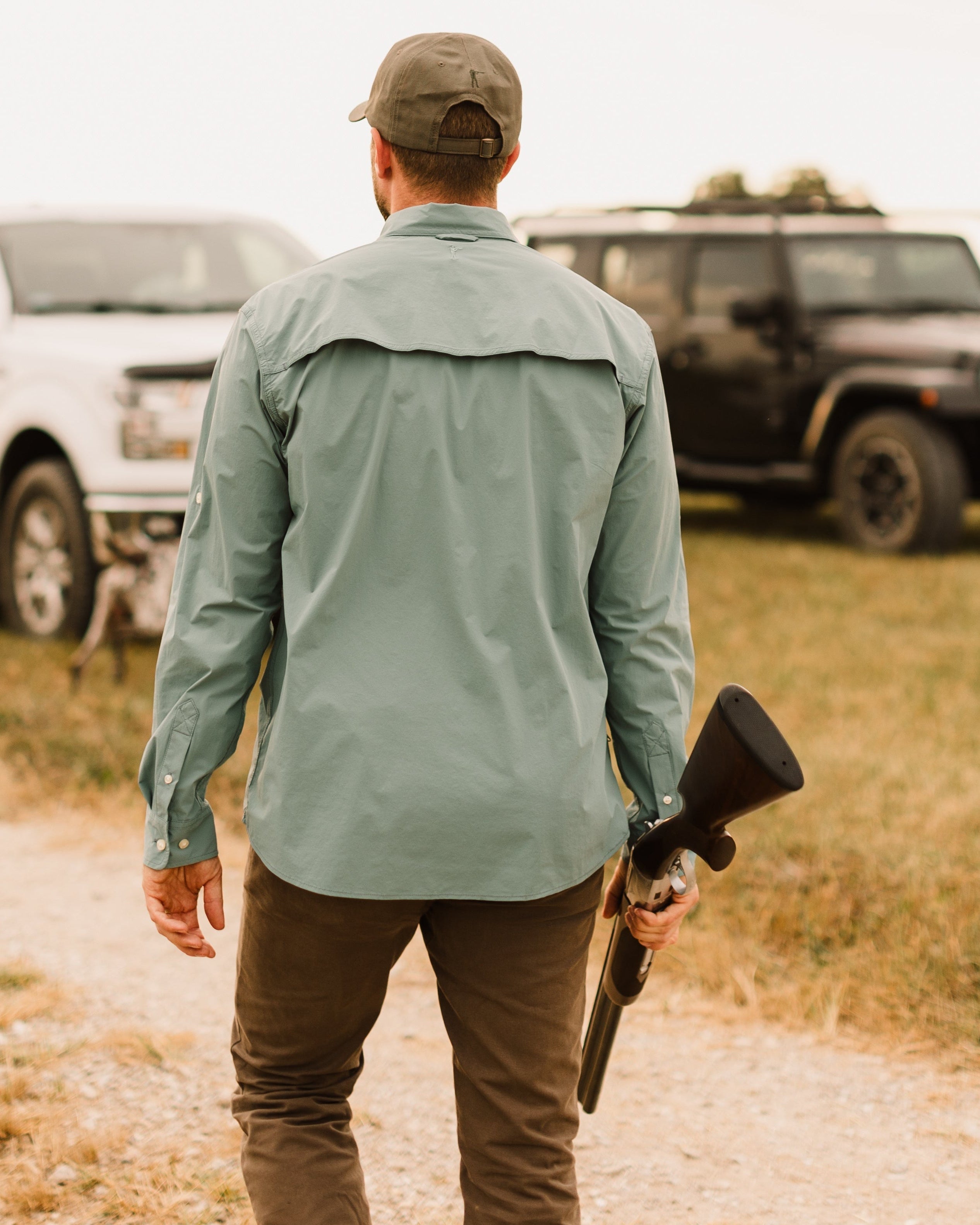 Man in cap, active shirt, and pants