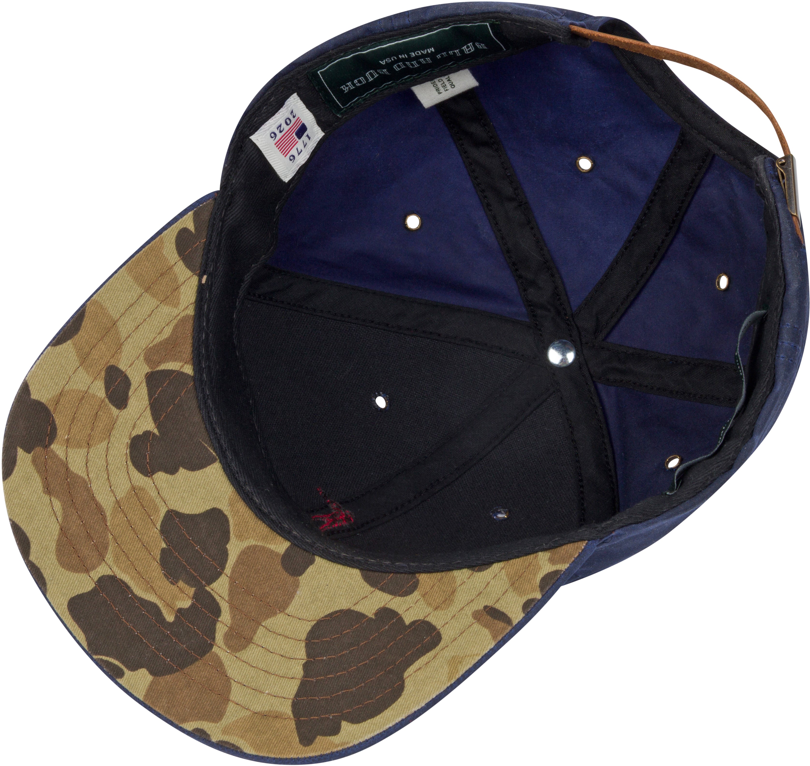 Camouflage-patterned cap with a blue interior and visible brand label.