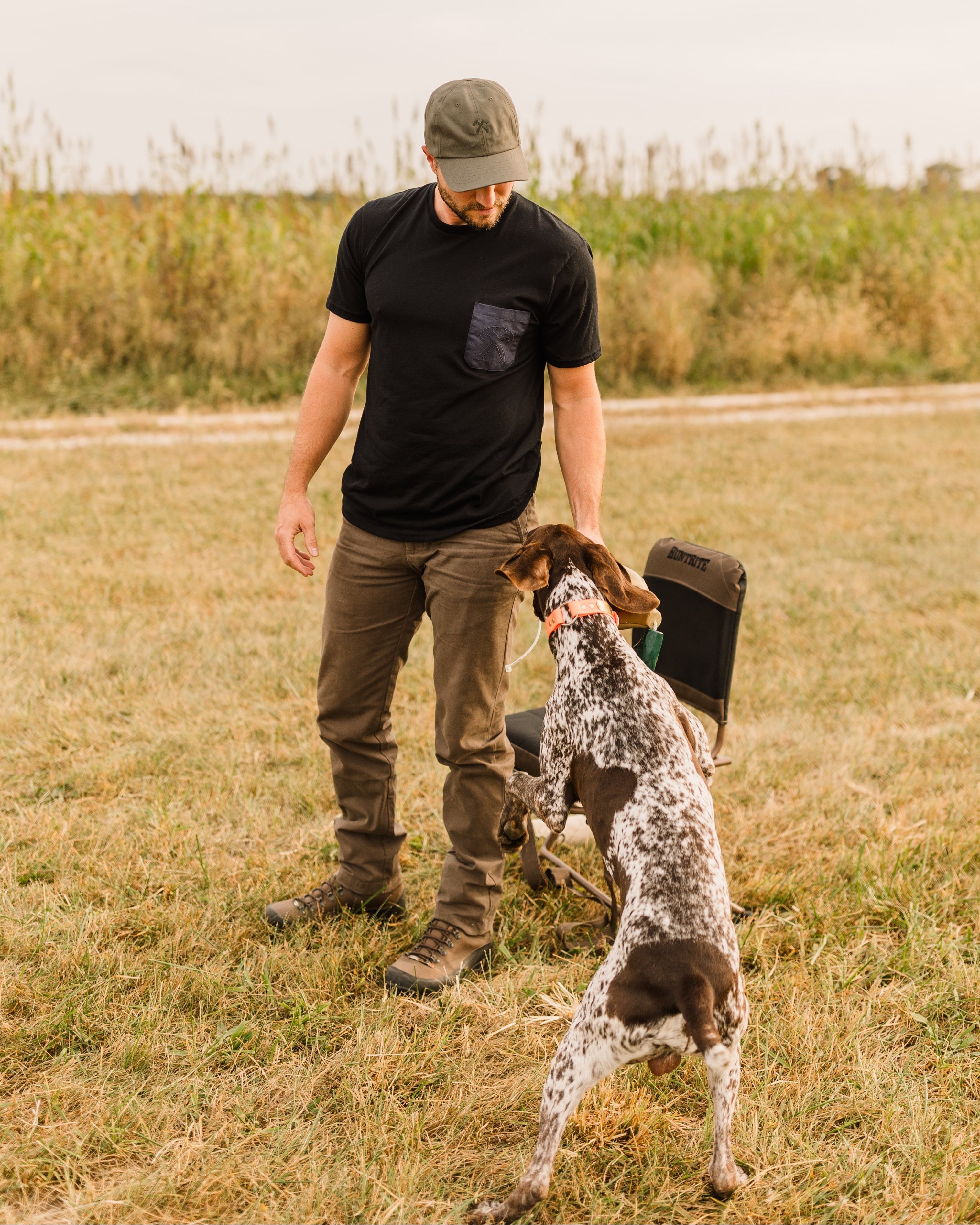 Man in heritage pants and t-shirt
