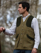 Men's Derby Tweed Winston Waistcoat in Forest Green, on model